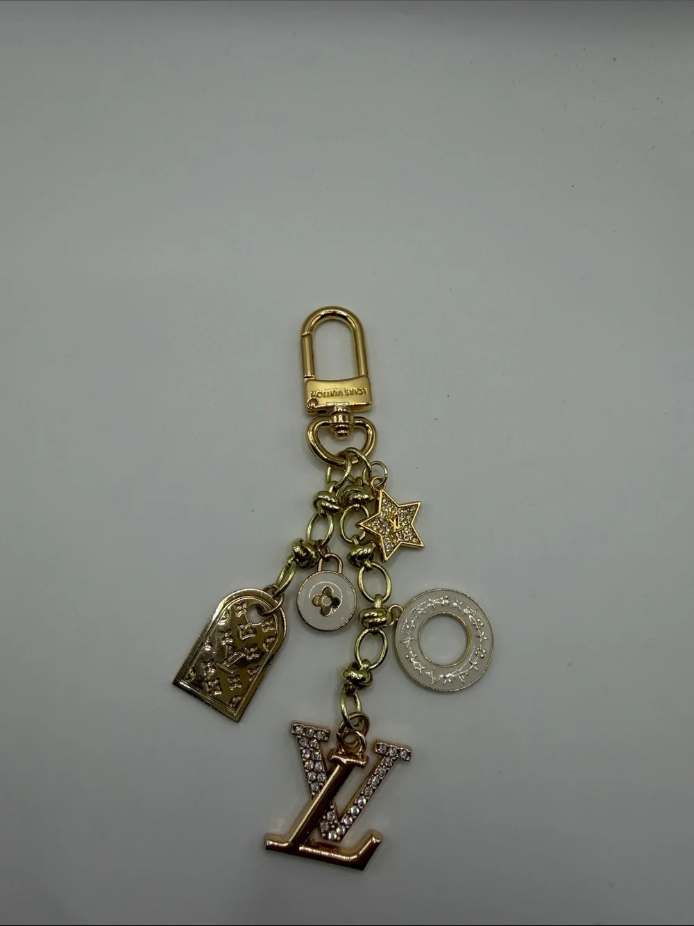 1416. Gold and Ivory Charm Key Holder